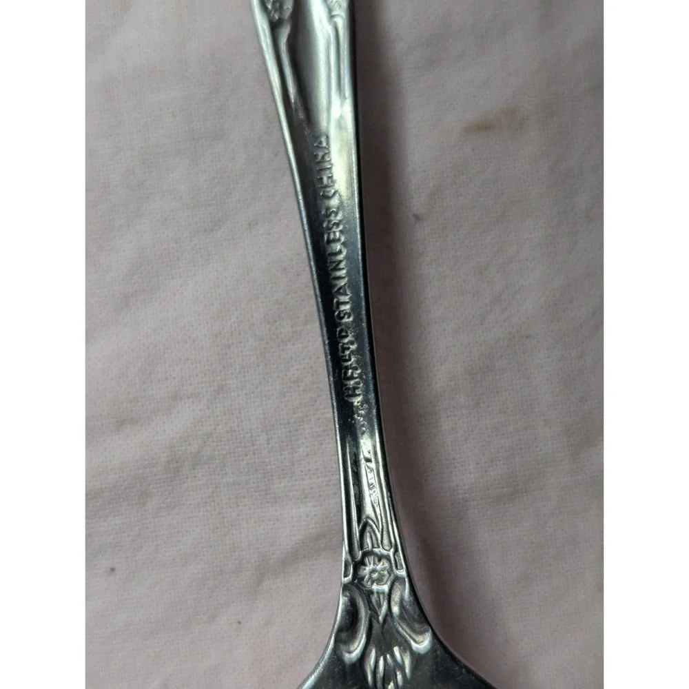 7 lot H.F. LTD Stainless stamped flower pattern 7